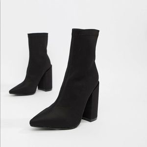 Black block heel sock boots